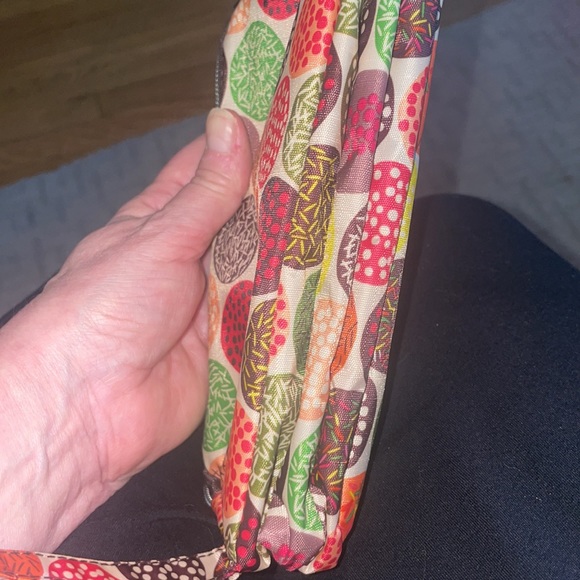 This cute little nylon wristlet with 3 zip pockets is NWOT’s - Picture 6 of 6